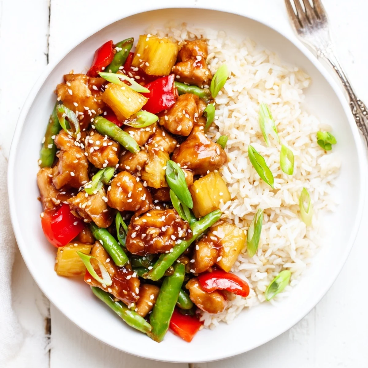 Pineapple Chicken And Rice plated for a weeknight meal, fragrant with ginger